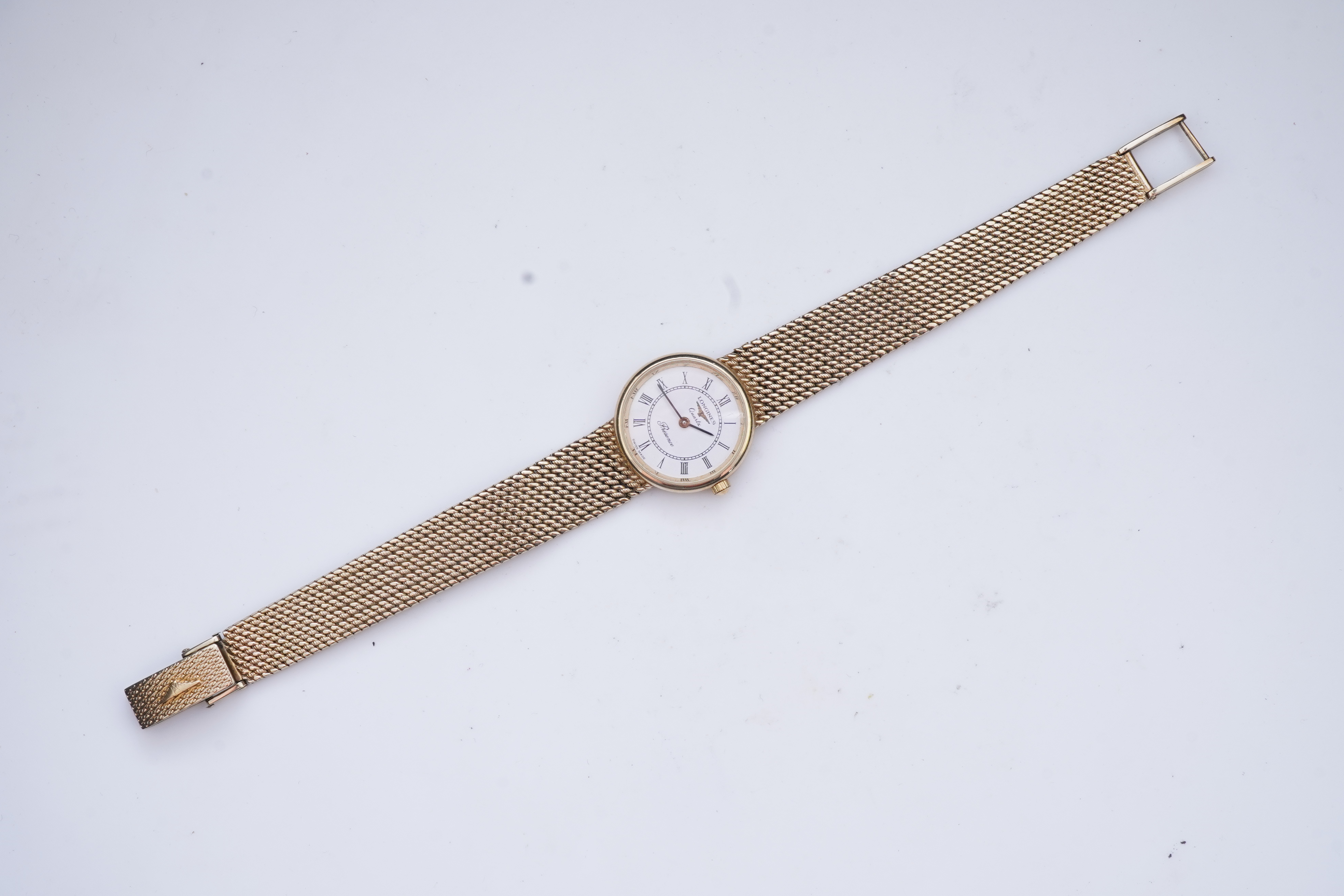 Longines, a gold watch